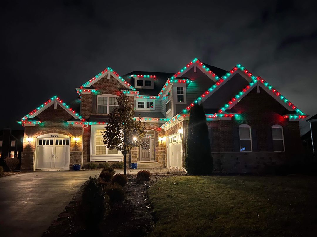 Roofline and tree Christmas light display