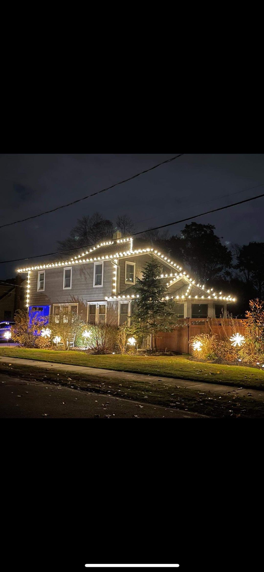 Warm white lights across a large family home