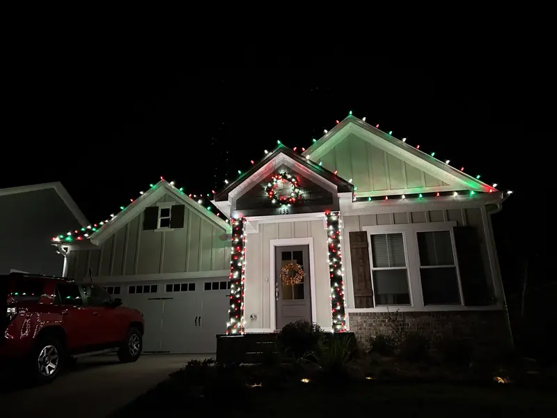 Craftsman with red, green and white C9s and wrapped porch columns